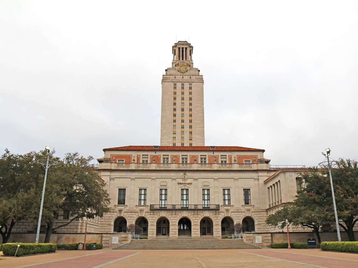 A clock tower - Main Building on the University of Texas at Austin Campus for article 10 Best Institutions for Higher Education in Austin for newcomers moving to Austin.