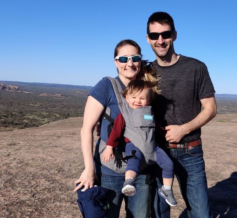 A family on top of Enchanted Rock