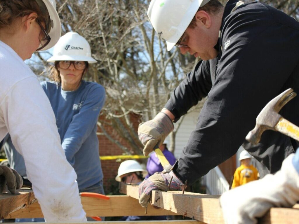 Habitat for Humanity project with undergraduate students working during spring break