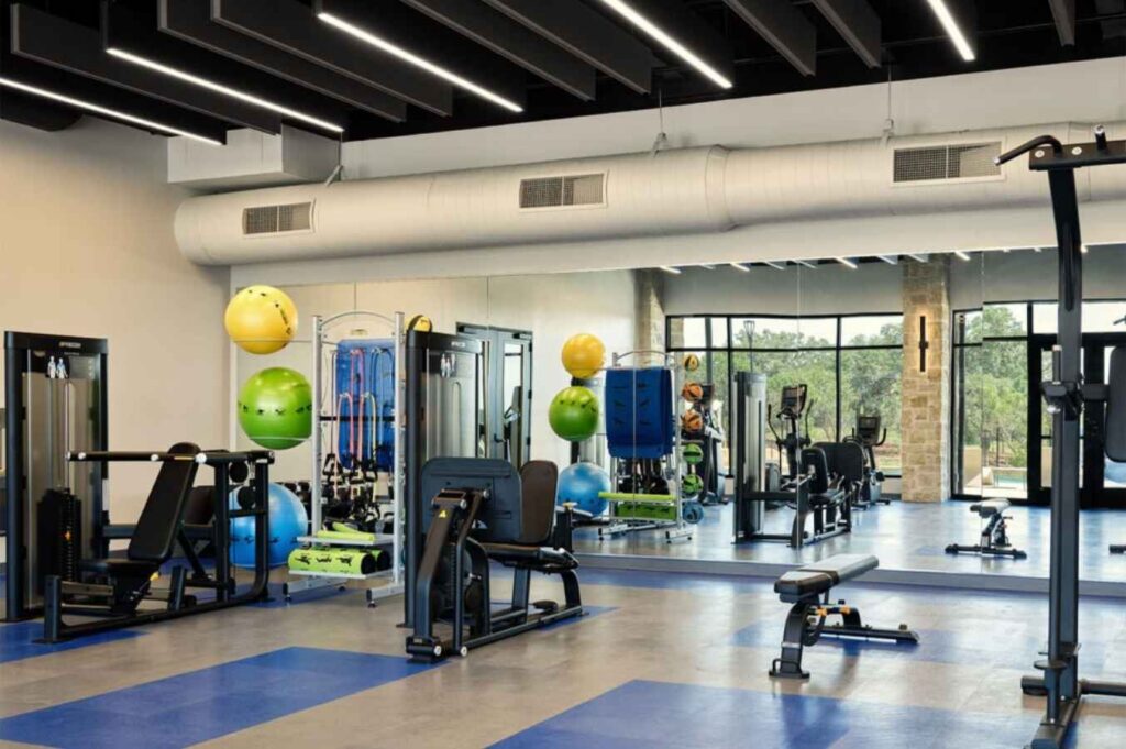Fitness Center showing workout equipment at La Cima in San Marcos for article La Cima in San Marcos for newcomers moving to Austin.
