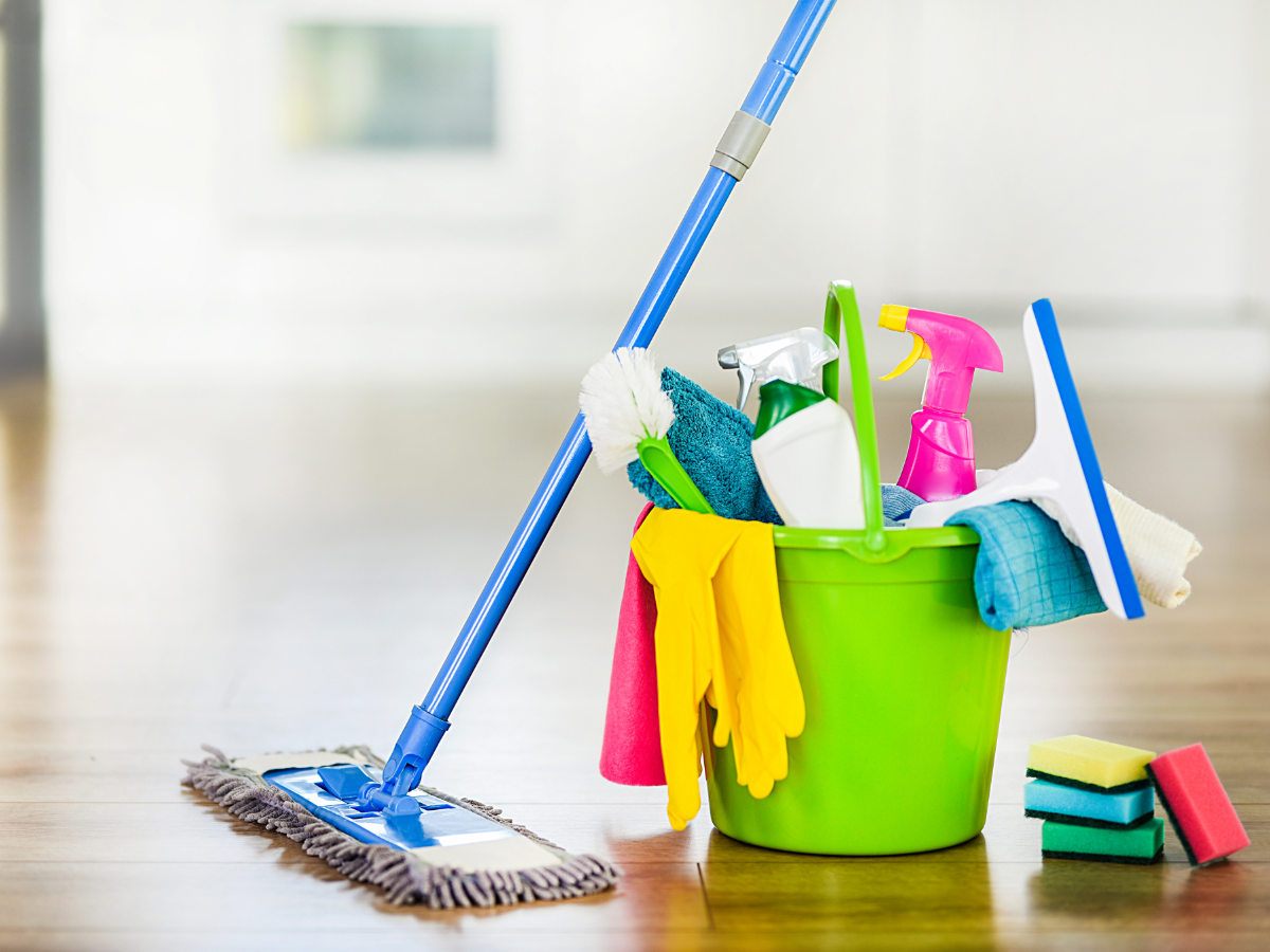 Bucket of cleaning supplies.