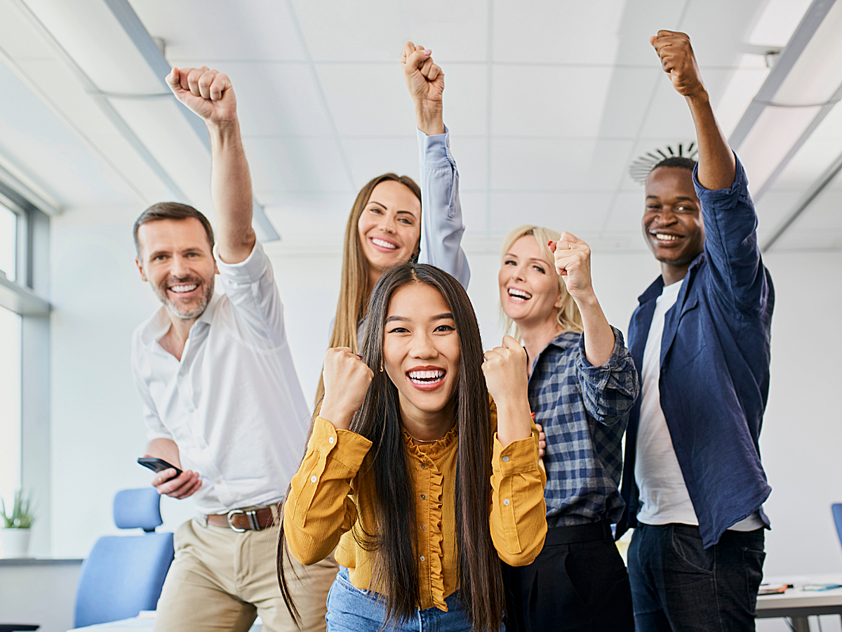 Coworkers cheering.