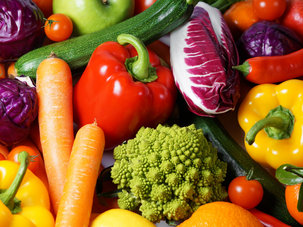 Close up of assorted and colorful nutritious fruits and vegetables.