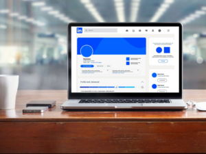 Laptop computer with blank LinkedIn page on screen.