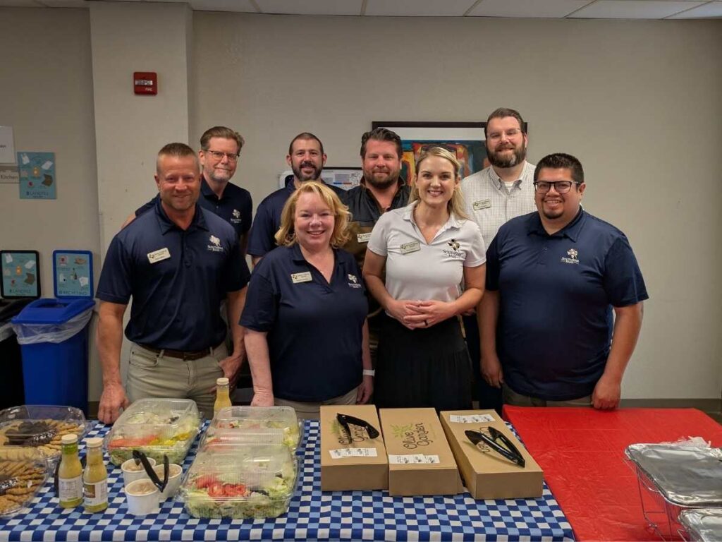 Group of employees at a supper club for article Unlocking Your Financial Potential with SouthStar Bank in Austin, TX for newcomers moving to Austin.