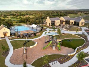 Aerial view of Nolina showing playground, pool, and walking paths for article Nolina — Where Life Blossoms for newcomers moving to Austin.