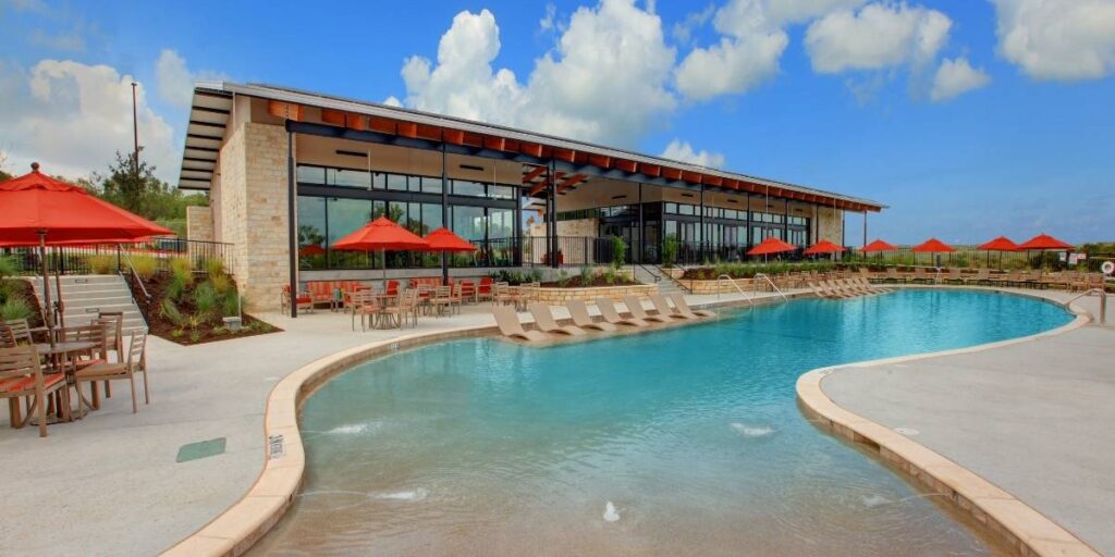 Pool area at Whisper Valley for article Whisper Valley Leads the Way in Sustainable Living in East Austin for newcomers moving to Austin.