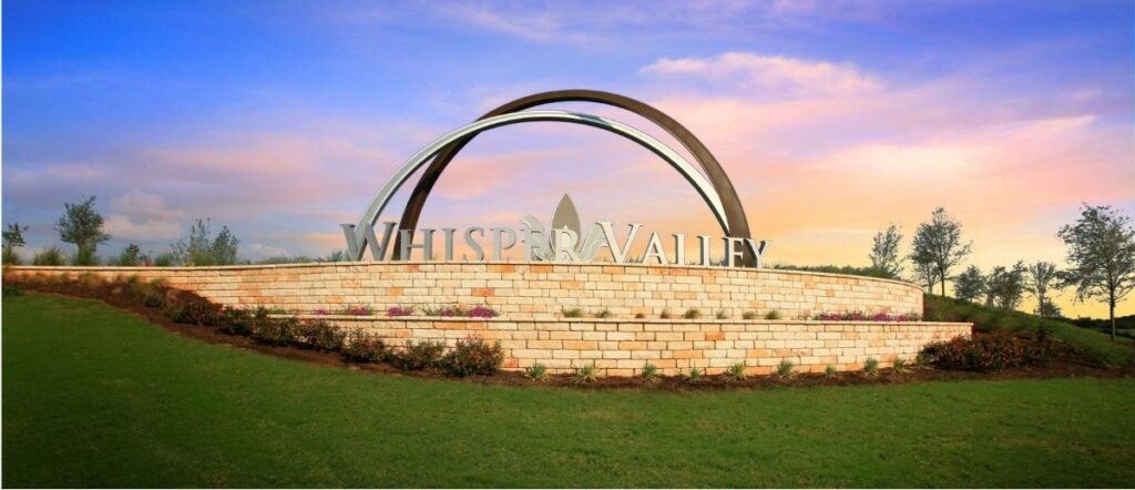 Front entrance of Whisper Valley for article Whisper Valley Leads the Way in Sustainable Living in East Austin for newcomers moving to Austin. 