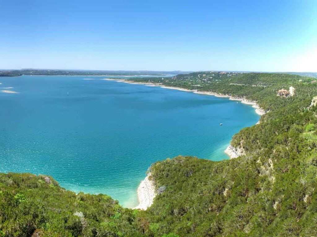 Aerial view of Lake Travis in Texas for article Austin's Lakes: A Deep Dive into History, Recreation, and Natural Beauty for newcomers moving to Austin area.