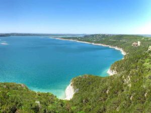 Aerial view of Lake Travis in Texas for article Austin's Lakes: A Deep Dive into History, Recreation, and Natural Beauty for newcomers moving to Austin area.