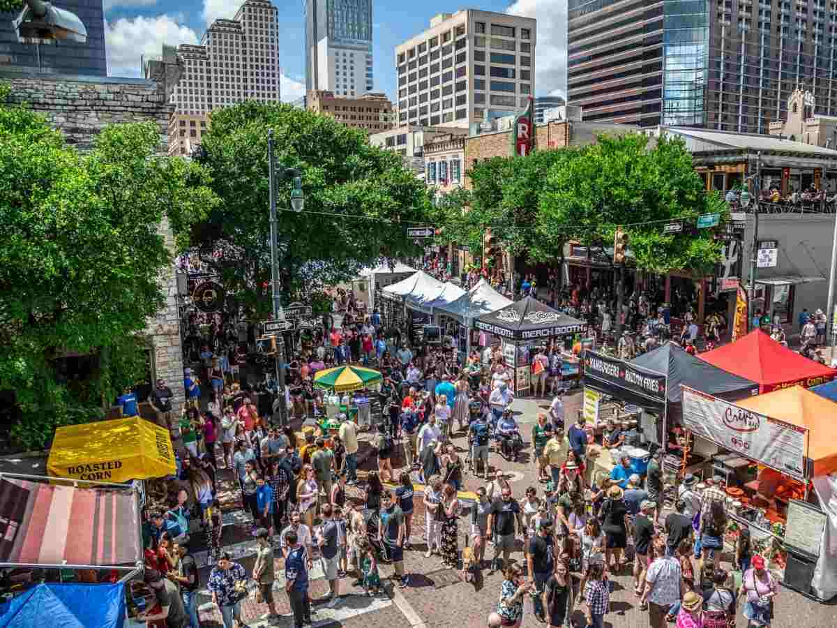 Aerial view of Austin festival for article The History of Austin’s Pecan Street Festival for newcomers moving to Austin.